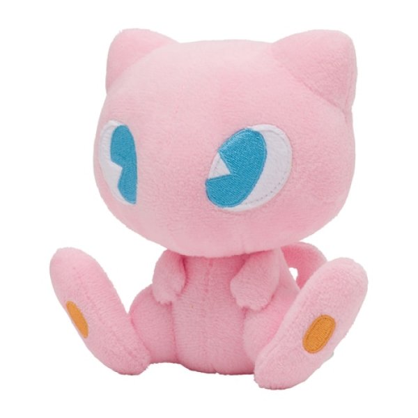 an image showing a plush of the pokemon mew.